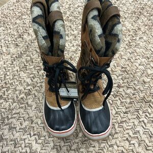 Sorel Tan and Black Snow Boots